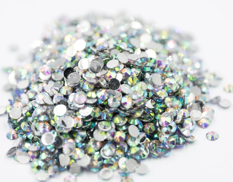 

Wholesale Flatback стразы Crystal AB Resin Non hotfix Rhinestones in Bulk Package Plastic Nail Art Decoration for Garment