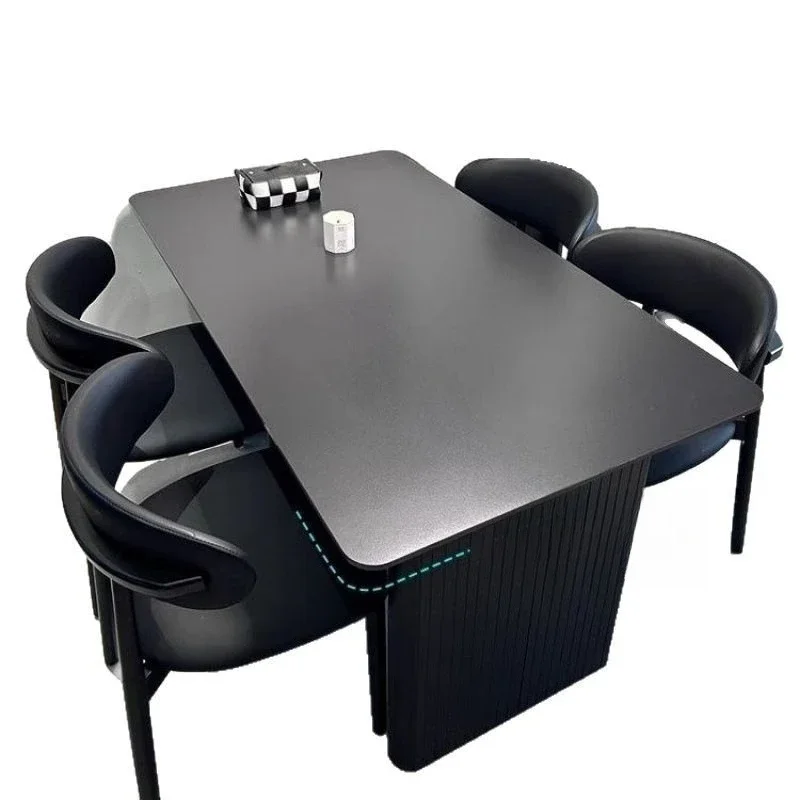 

Italian minimalist black matte rock slab dining table and chair combination small apartment light luxury home rental dining