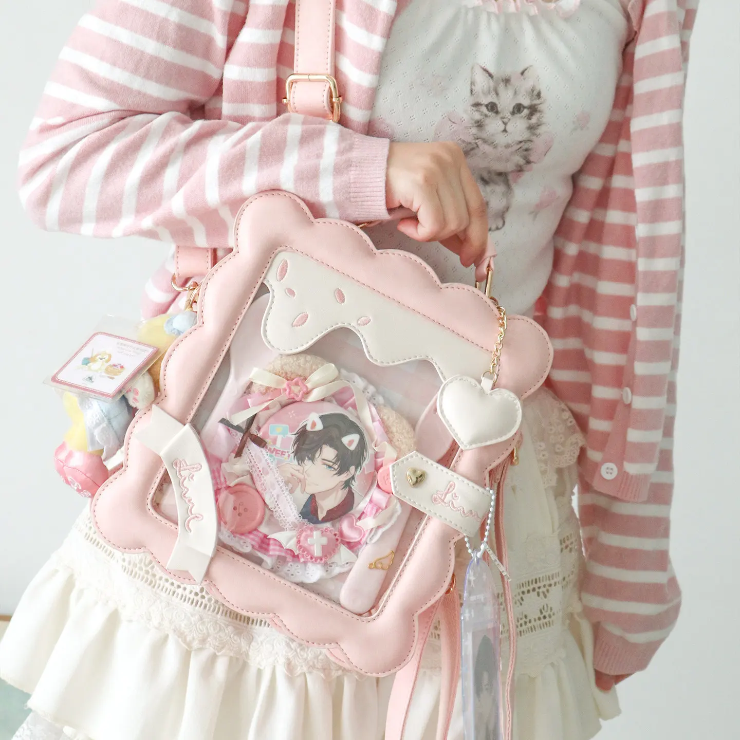 

Японская оригинальная милая милая мультяшная сумка для печенья Lta, сумка через плечо, детская сумка, небольшой объем еды, повседневная двумерная женская сумка