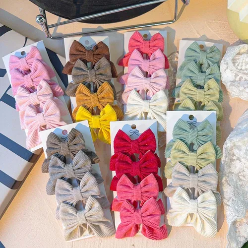 Imagen 1 del producto 4 Uds. Pinza para el pelo con lazo de algodón y lino de Color sólido colorido, accesorios para el cabello de aleación para niños que no daña el cabello, regalo para niñas