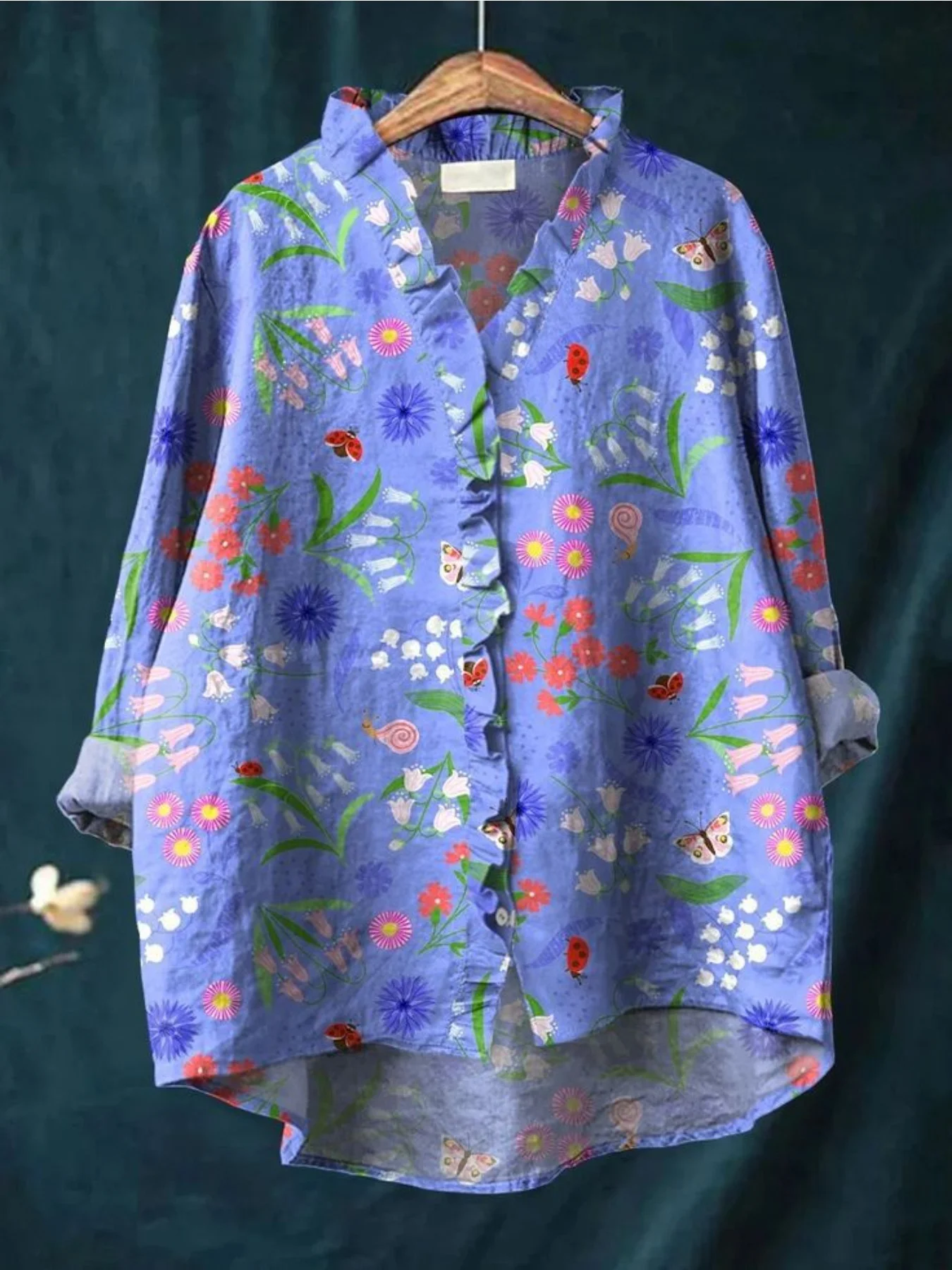 Ladies' printed long sleeved shirt with ruffled neckline, Comfortable and easy to maintain polyester fiber.