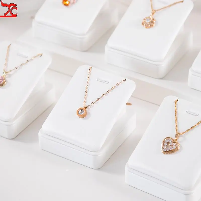 

Белое кожаное ожерелье, кулон, органайзер, стеллаж для выставки товаров для ювелирного магазина, стойка, выставочная цепочка, серьги, витрина ювелирных изделий, реквизит