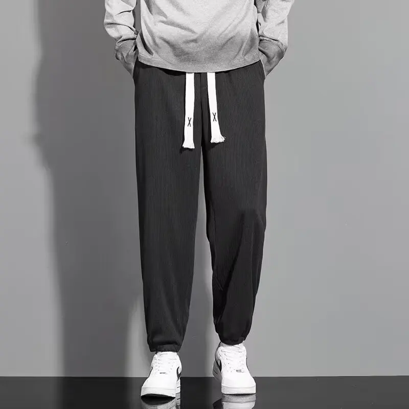 

Men's Japanese casual loose cropped pants artistic and popular simple summer cool casual pants fashionable ankle tied pants