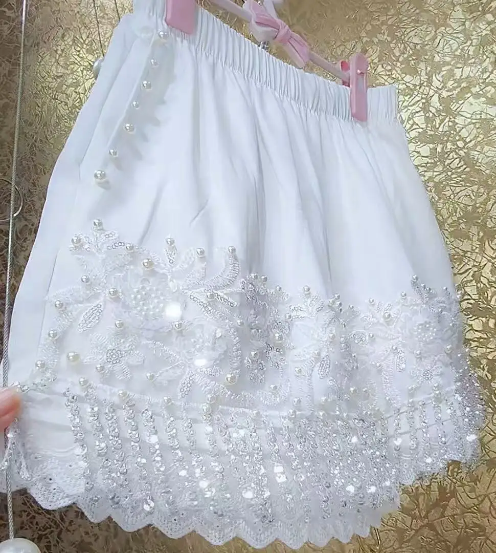 Novo em design de luxo high street y2k shorts brancos para mulheres 2025 verão quente curto cintura elástica calças curtas roupas femininas