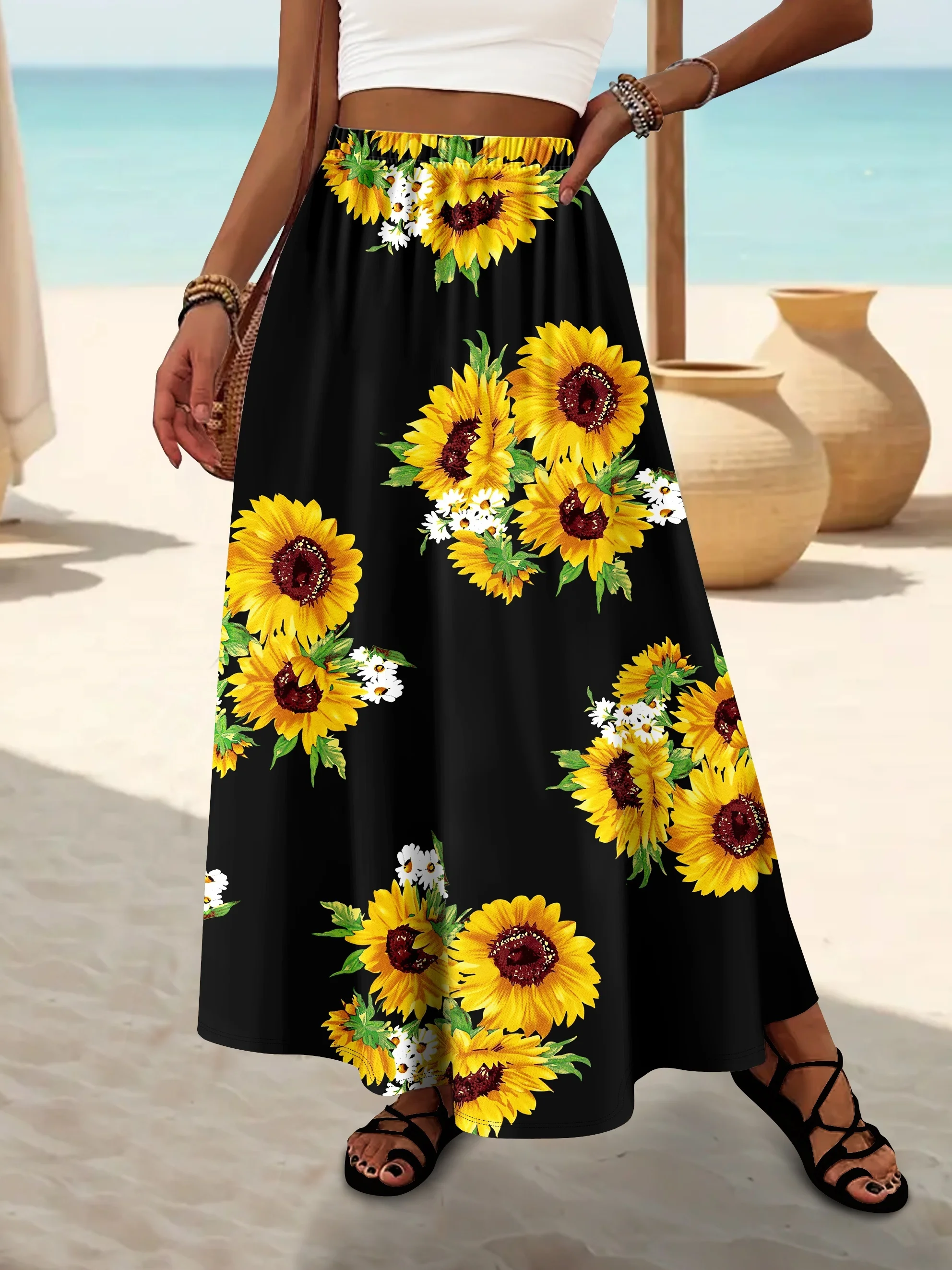 

Женская яркая струящаяся макси-юбка трапециевидной формы с ярким принтом подсолнуха и изящным ромашковым принтом на черной основе и высокой талией для повседневных прогулок