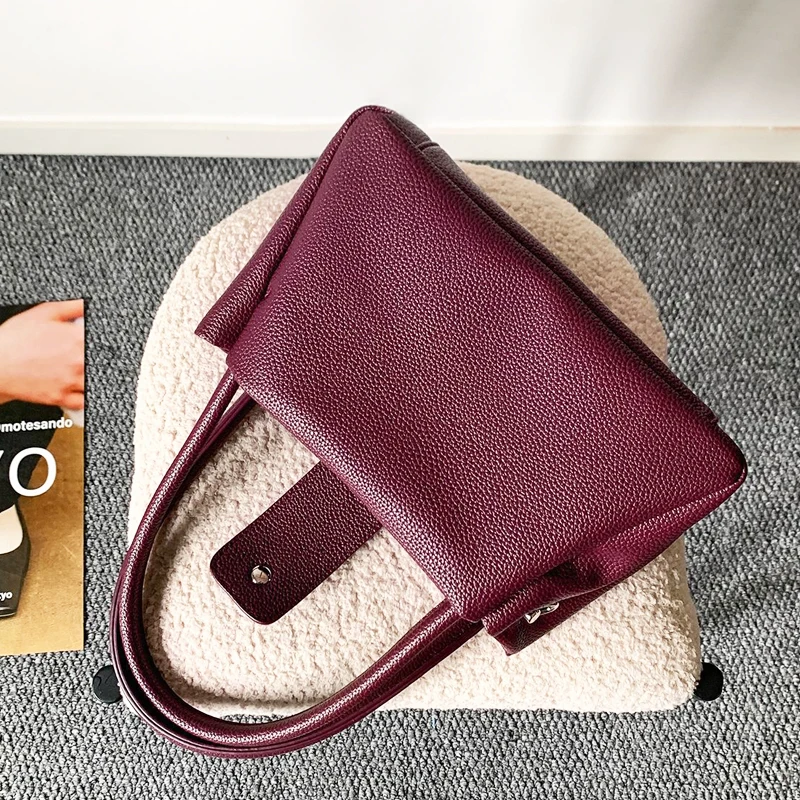 حقائب نسائية كورية كاجوال فاخرة بتصميم جديد لعام 2026، مصنوعة من مادة البولي يوريثان، بنمط الليتشي، مع جيب داخلي وحقيبة كتف بمقبض علوي جودة عالية ًالشحن مجانا وصول الشحن السريع