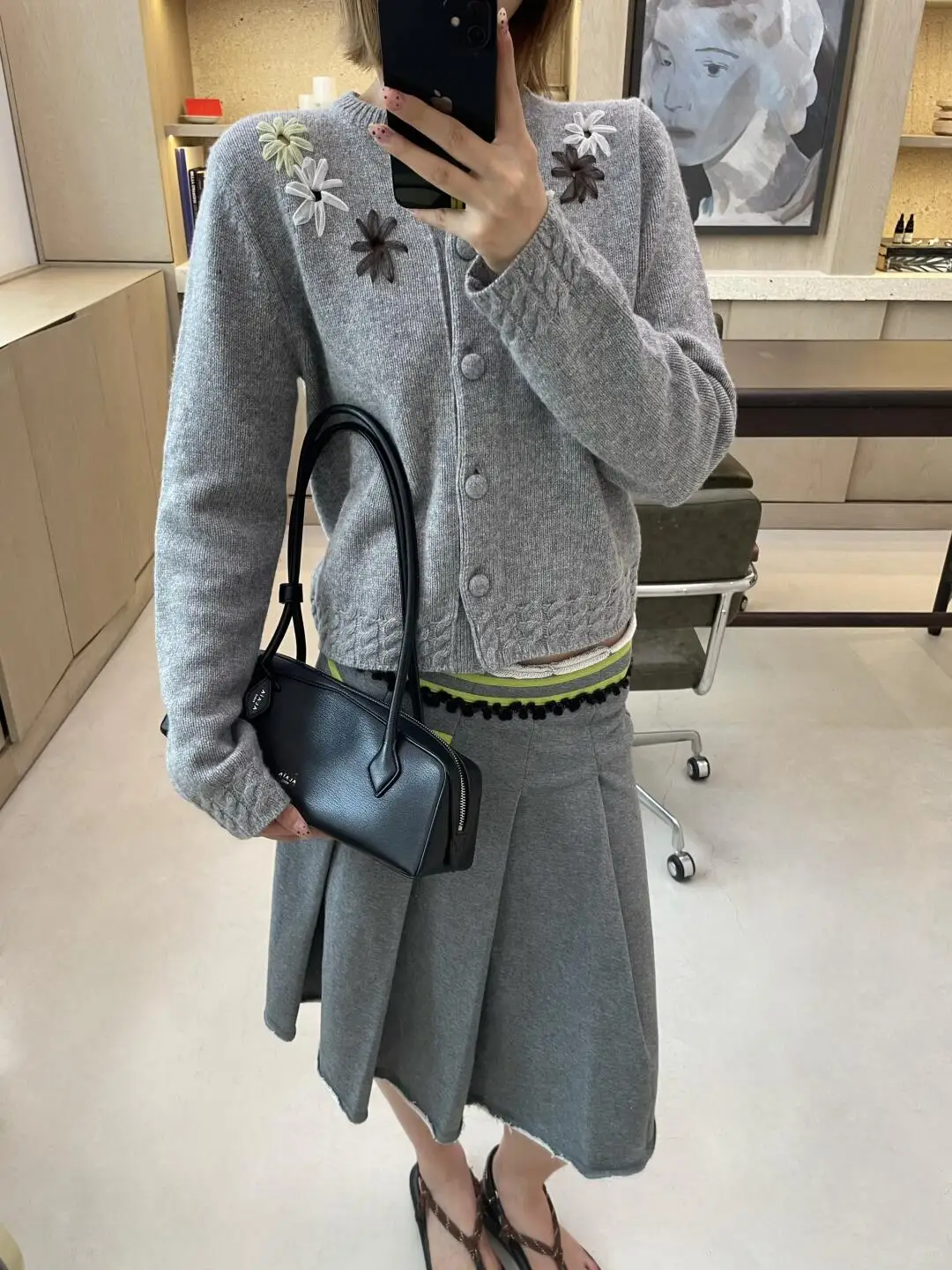

All-purpose business casual knit cardigan coat. Hand-sewn openwork holey cotton wool sweater for women.