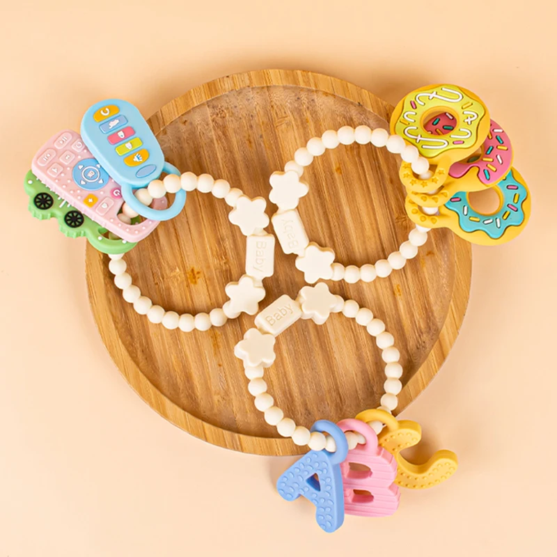 Silicone Teething Bracelet, Baby Teething Toy, Food-Grade Silicone Teether, Detachable Soothing Teether, Early Education Wrist Teether for Babies view 3