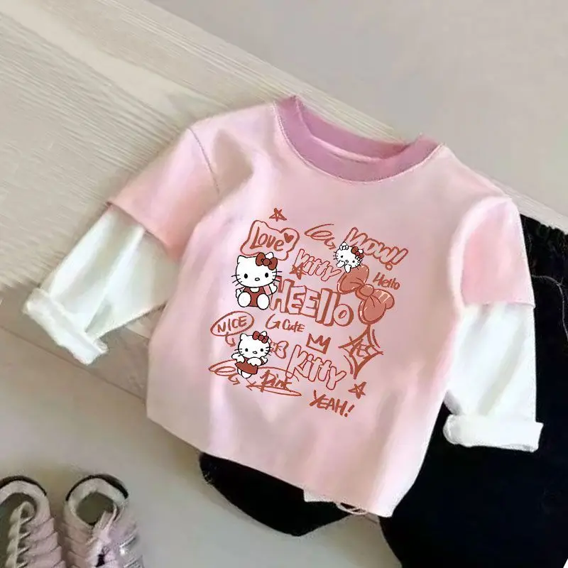 

Новинка 2026 года, детская хлопковая футболка Sanrio с длинными рукавами и милым рисунком Hello Kitty, весенне-осенние детские топы для маленьких девочек