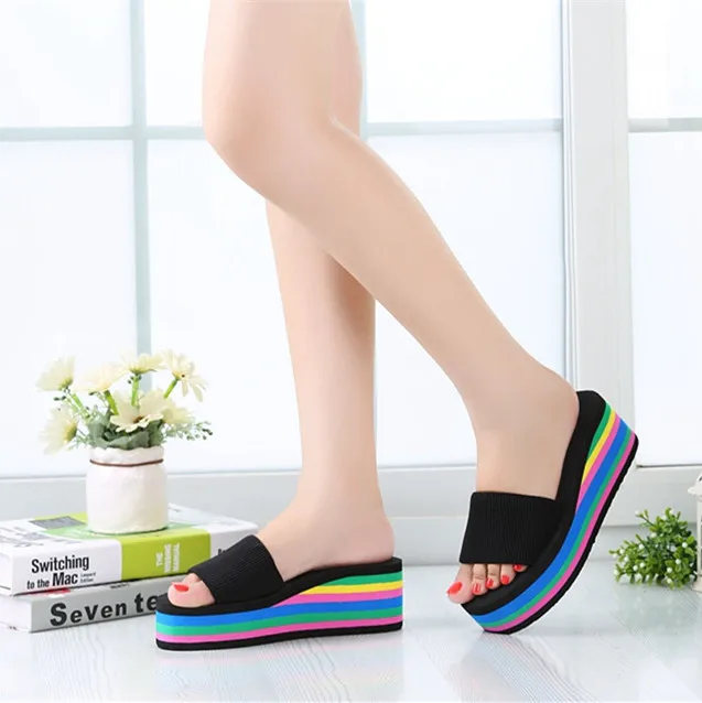 Thick soled fashionable women\'s slippers new European style color stripe trend casual slope heel raised beach one line sandals