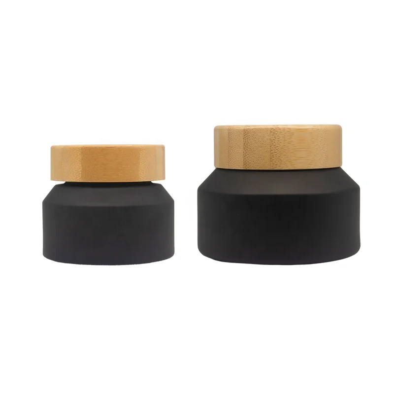 

Cosmetic bottle and jar set packaging matte black slant shoulder glass bottle and jar with bamboo lid 15g 30g 50g