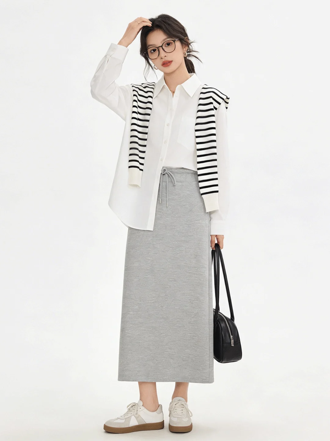 

Новая корейская длинная юбка на весну 2026: повседневная, с завышенной талией, стройнящая, приятная к телу, простая, универсальная, прямого кроя, для ранней весны.