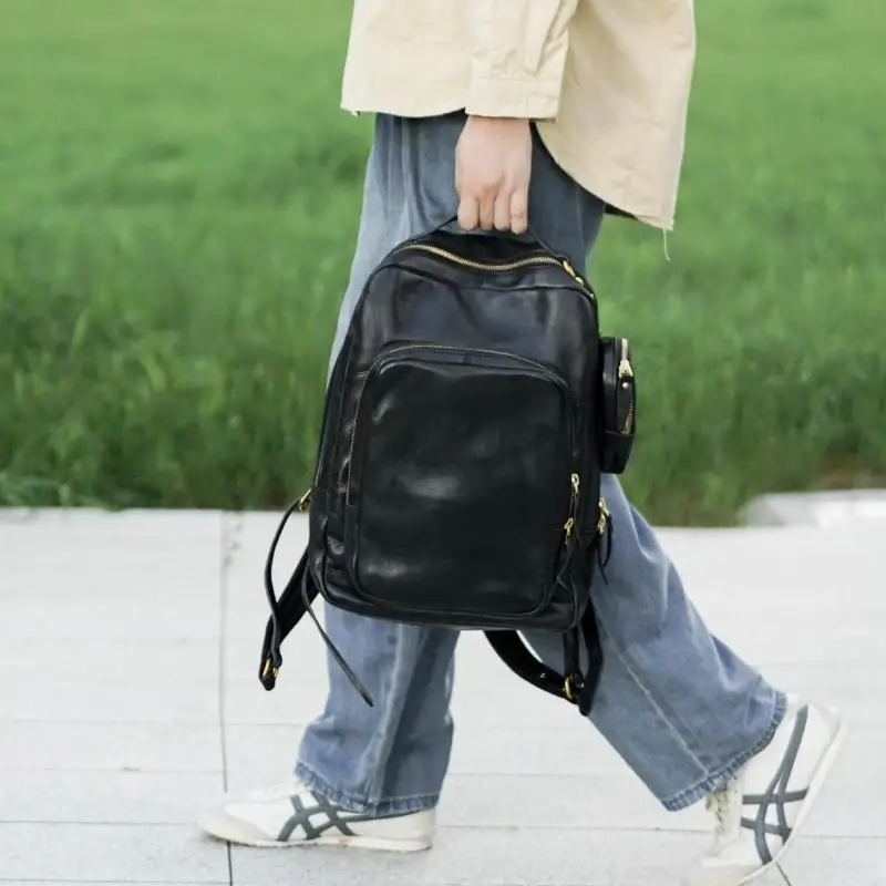 

casual travel vegetable tanned cowhide women black backpack Fashion designers handmade genuime leather large-capacity schoolbags