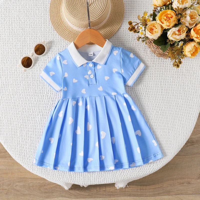 

INSInfant and toddler girl's summer style dress with a turn-down collar, heart print, ruched waist, and short sleeves, trendy