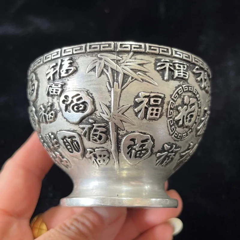 Antique and miscellaneous collectibles: A Qing Dynasty Qianlong era "Hundred Blessings" wine , white copper tea cup, symboliz