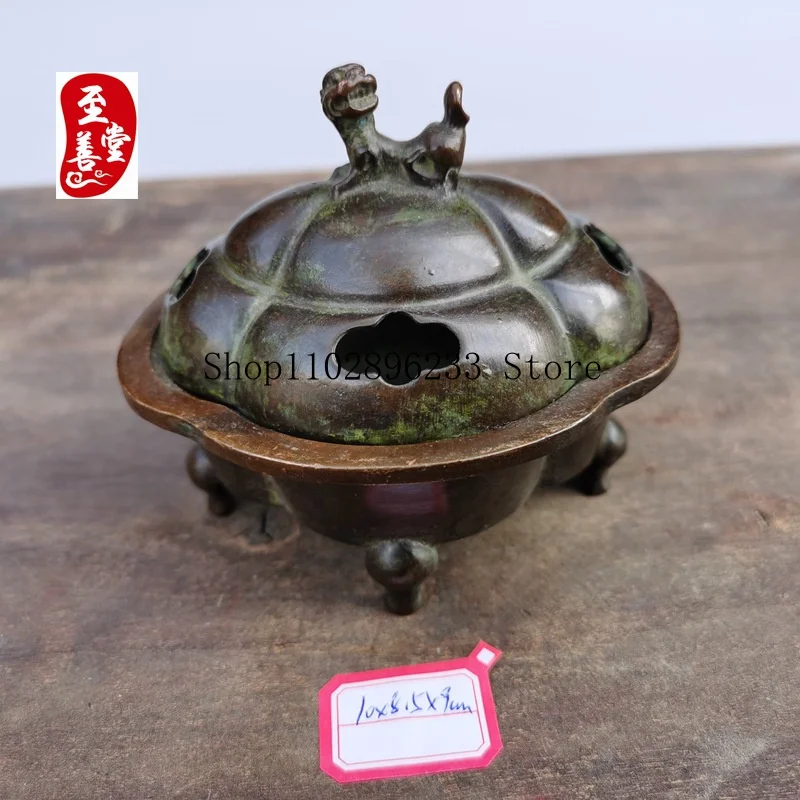 Antique-style alloy copper incense burner with a patina effect, designed for living room decoration, featuring a lion-shaped lid