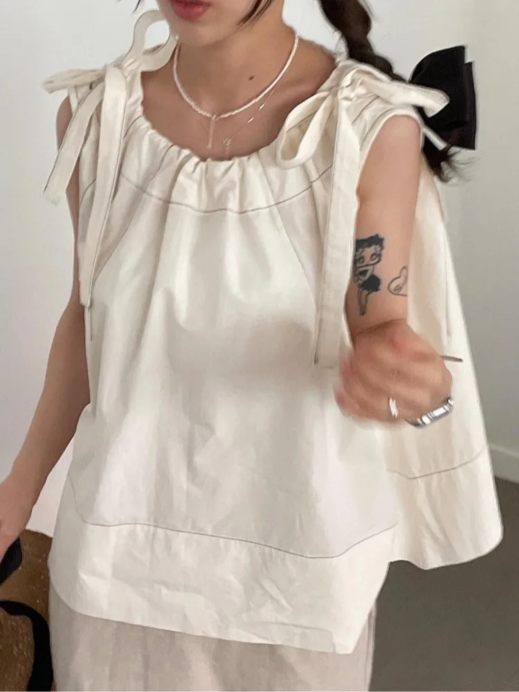 レトロエレガントなノースリーブシャツ女性の夏の新しい甘い蝶結びショルダーストラップルーズ多用途トップ快適なフィット感