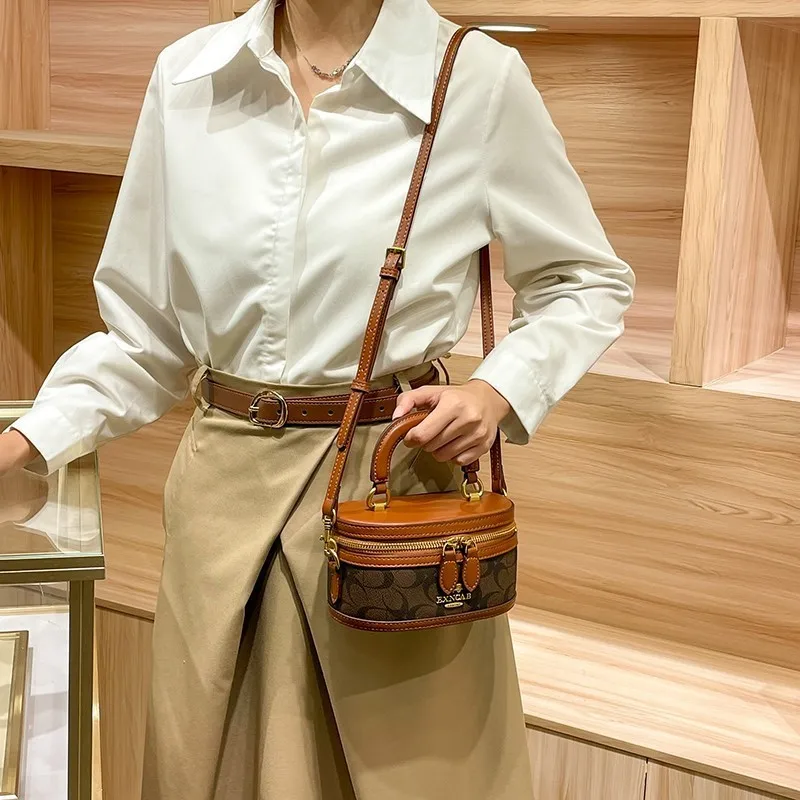 

Light luxury niche design lunch box bag, fashionable contrasting color water bucket bag, 2025 new single shoulder crossbody hand