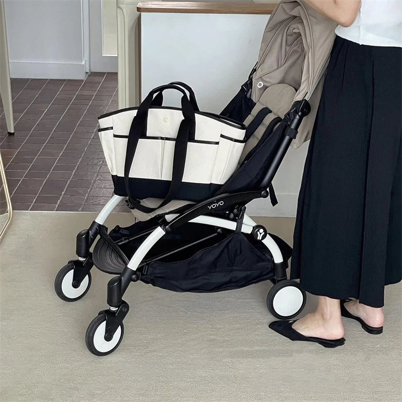 1pcs mommy bag large capacity casual versatile crossbody mother and baby bag out handheld lightweight canvas mom bag