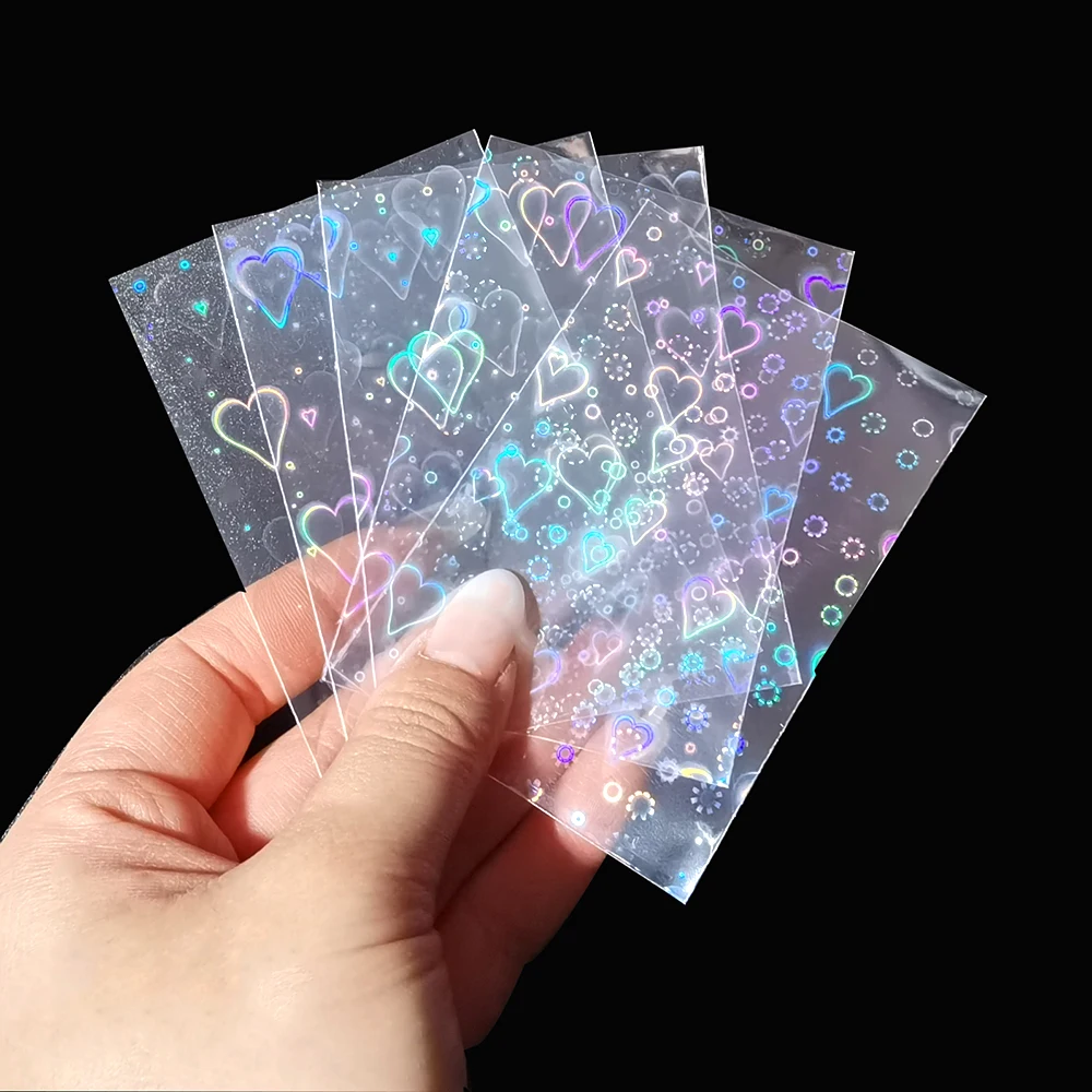 

100pcs Heart-shaped Laser Flashing Card Film Holographic Idol Photo Card Sleeves Tarot YGO Ultra Super Card Shield Cover