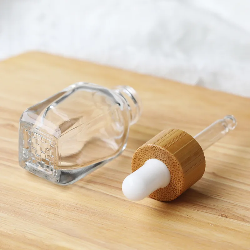 10/15pcs 10ml 30ml garrafas conta-gotas de vidro transparente/rosa com tampa de bambu garrafas vazias de óleo essencial com pipetas de vidro