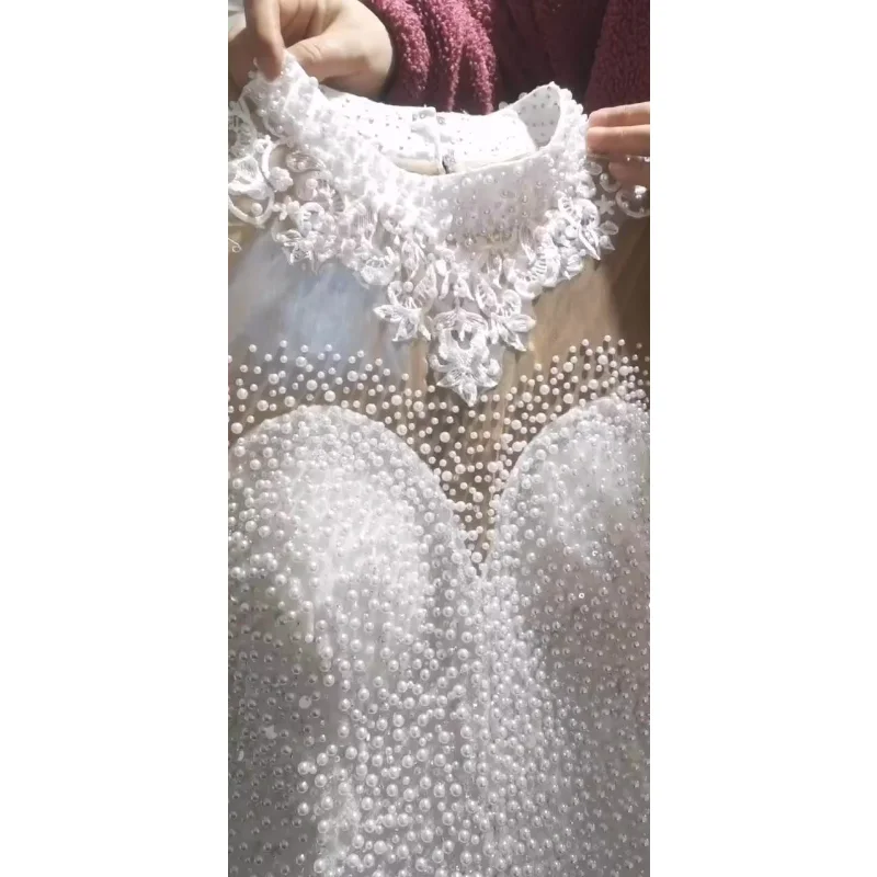 Customized Spring Luxury Heavy Pearls Beaded Wedding Dresses Long Sleeves High Neck Bling Bling Ball Gown Plus Size African Wedd