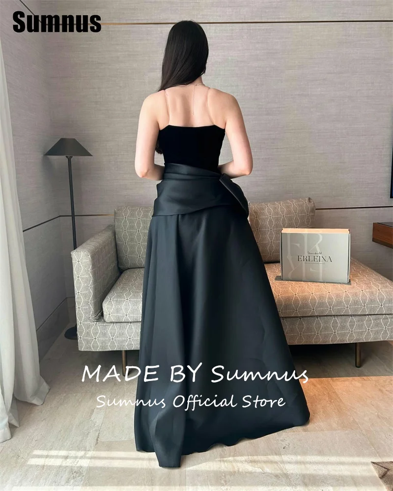 فستان Sumnus الحديث على شكل حرف a للحفلات الراقصة بدون حمالات أسود بدون أكمام طيات فيونكة فساتين رسمية طول الأرض فستان سهرة 2025 مخصص