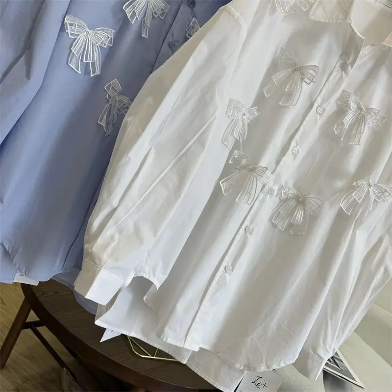 Camisa feminina de estilo coreano com gola solta em forma de laço de renda 3D