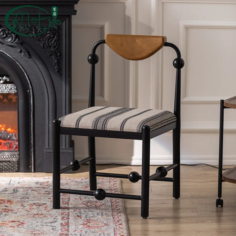 

Simple wrought iron back chair