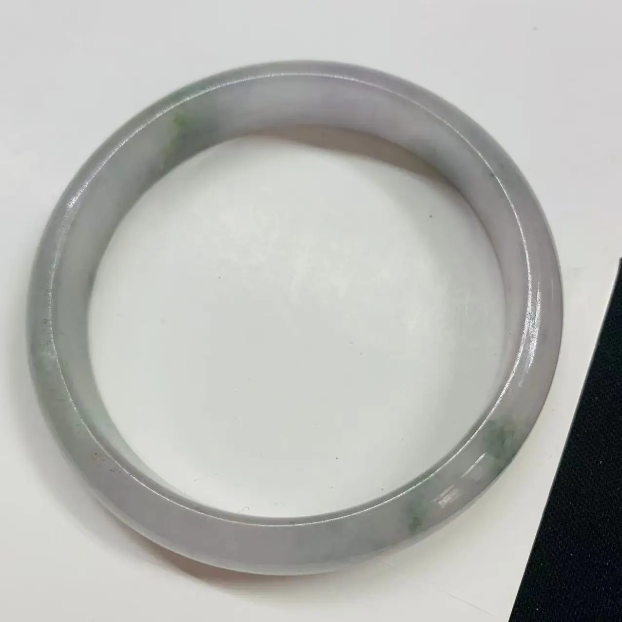 

59.1mm light green jade bracelet photographed in real life