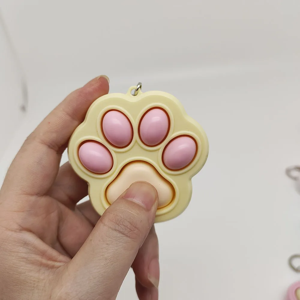 Cartone animato Kawaii gatto artiglio pulsante decompressione giocattolo portachiavi ciondolo coppia carina borsa auto ciondolo portachiavi creativo