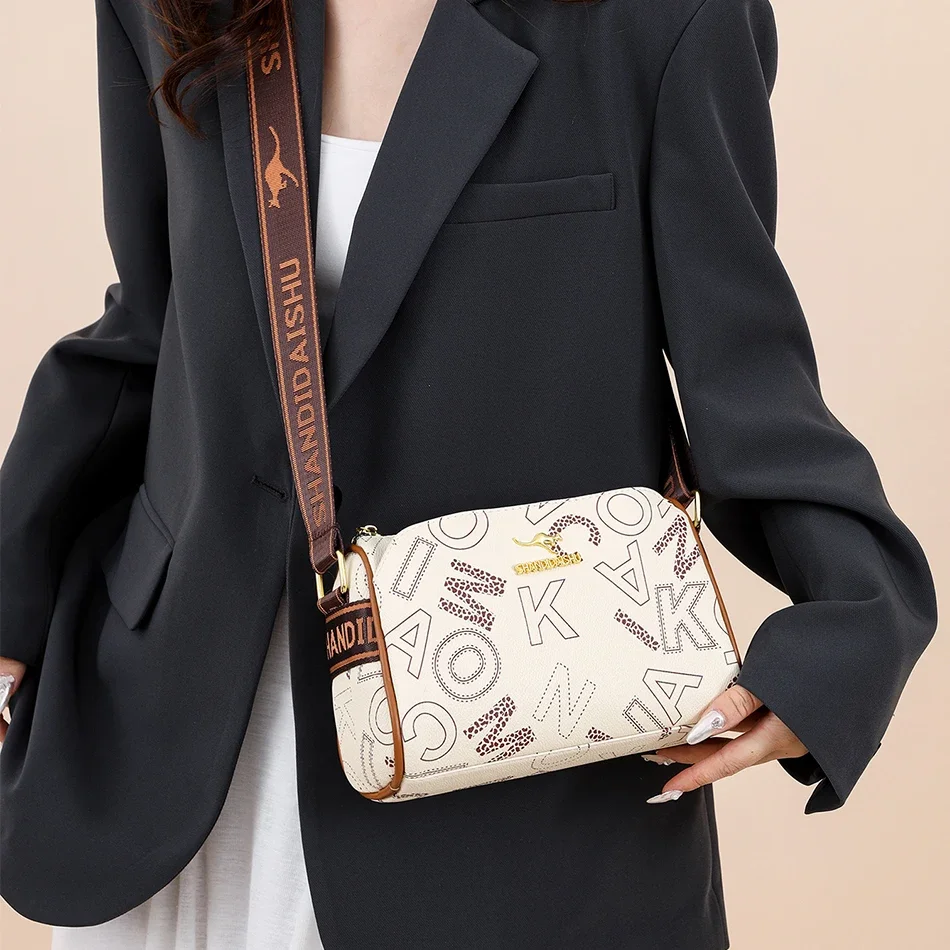 Luxury Kangaroo Logo Crossbody Bag with Printed Design Wide Strap Stylish Magnetic Snap Pockets Premium Gold Hardware