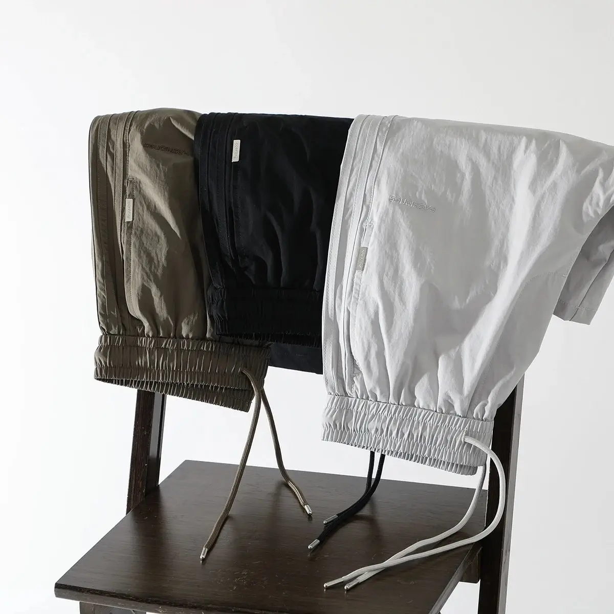 

Summer Men's Casual Sports Loose Beach Pants ort Pants Five-Quarter Pants Side Stripe Splicing Military Sle Youth Vitalit...