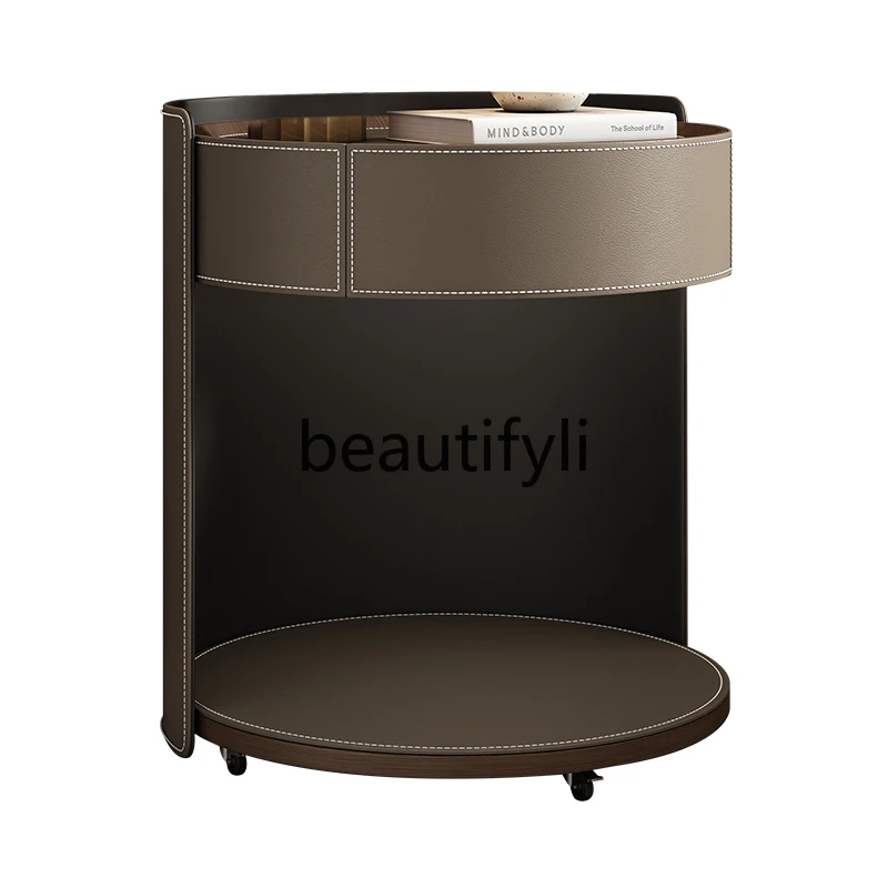 

Italian minimalist bedside table fashion solid wood high-end designer round saddle leather light luxury locker