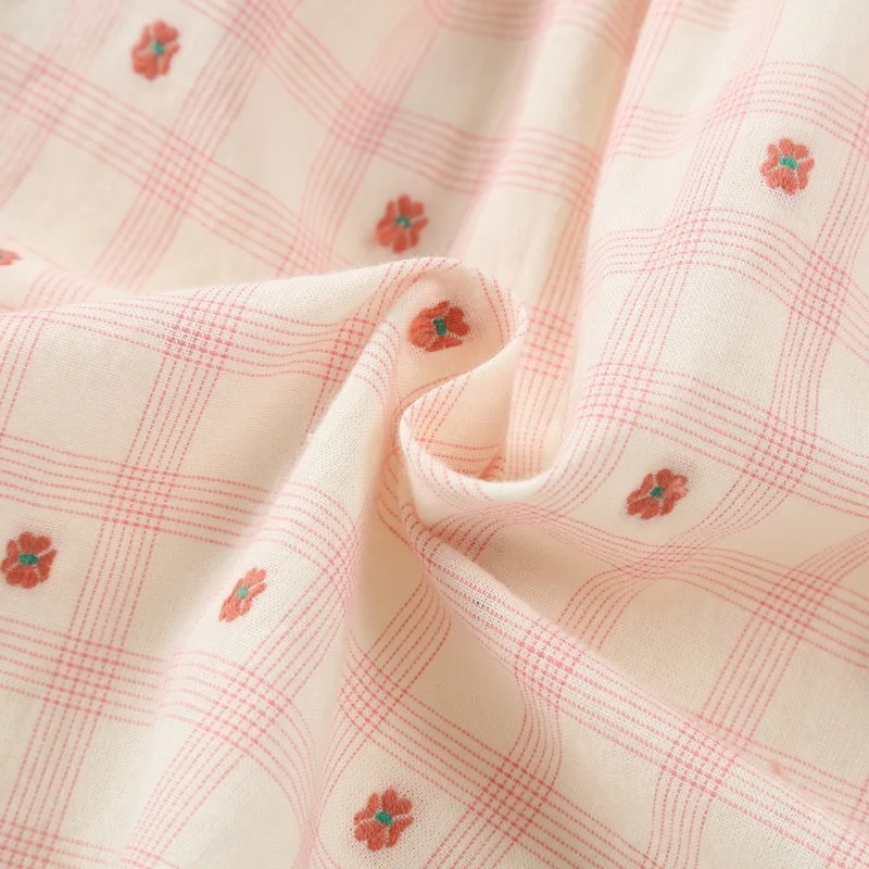 فستان Ins Kids Boutique للفتيات باللون الوردي الفرنسي الحلو من القطن الممشط بياقة الدمية الحلوة للأطفال ملابس الفتيات على شكل زهرة للتدخين