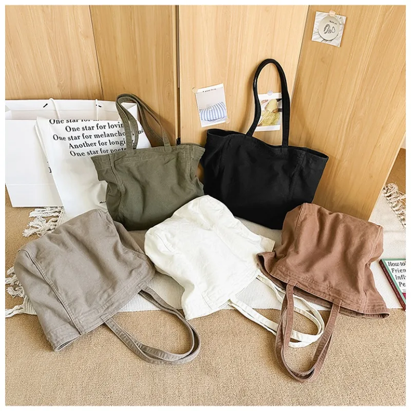 

Fashion Versatile Canvas Zipper Sweet Shoulder Bags for Women 2026 Hot Sale Retro Simple Large Capacity Casual Style Tote Bags