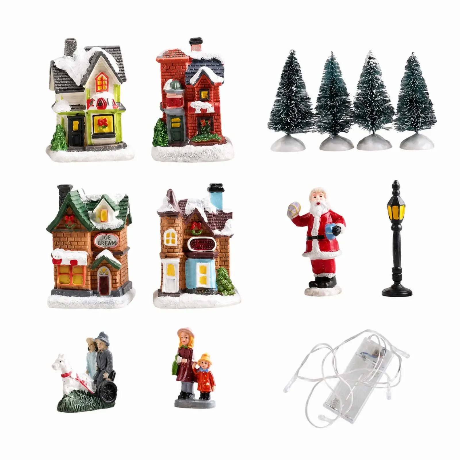 クリスマスを彩るテーブル装飾に最適な、サンタクロースのフィギュアとモミの木が付属した、小さくて可愛らしい樹脂製のクリスマスハウスセット。