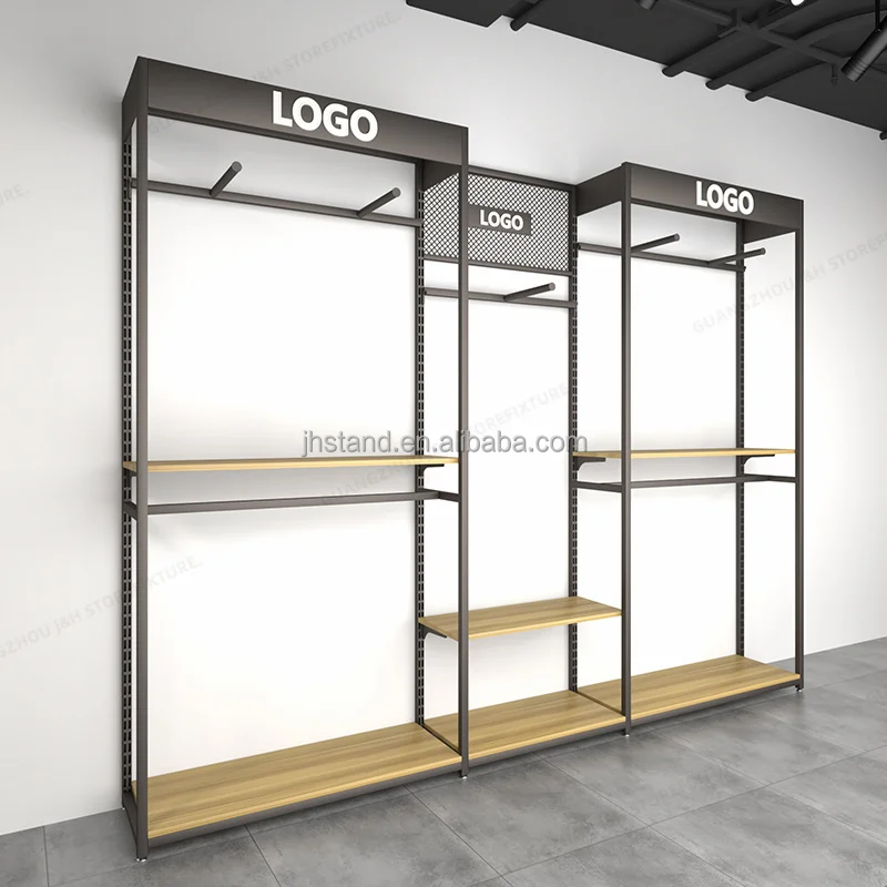 

customized.adjustable height showroom display rack man wood retail clothing store fixtures sport store interior design With