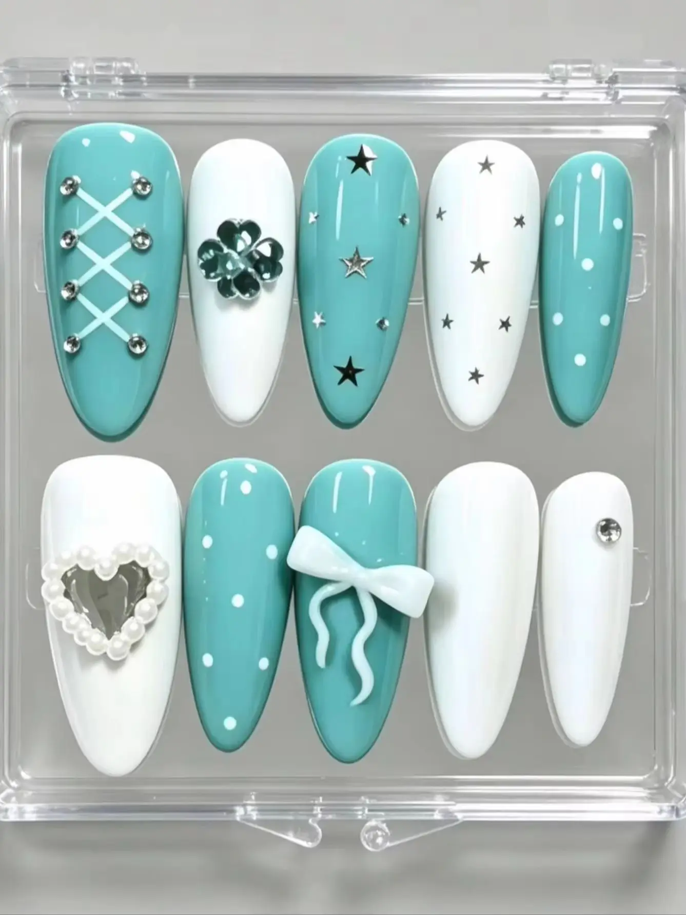 10-Piece Set of Mint Blue and White Y2K Star Bowknot Press-On Nails, Fresh Mint Lake Blue + Milky White Color Contrast, Y2K Sweet and Cool Style, Featuring 3D Bowknots, Pearl Hearts, and Four-Leaf Clover Rhinestones, Full of Detail