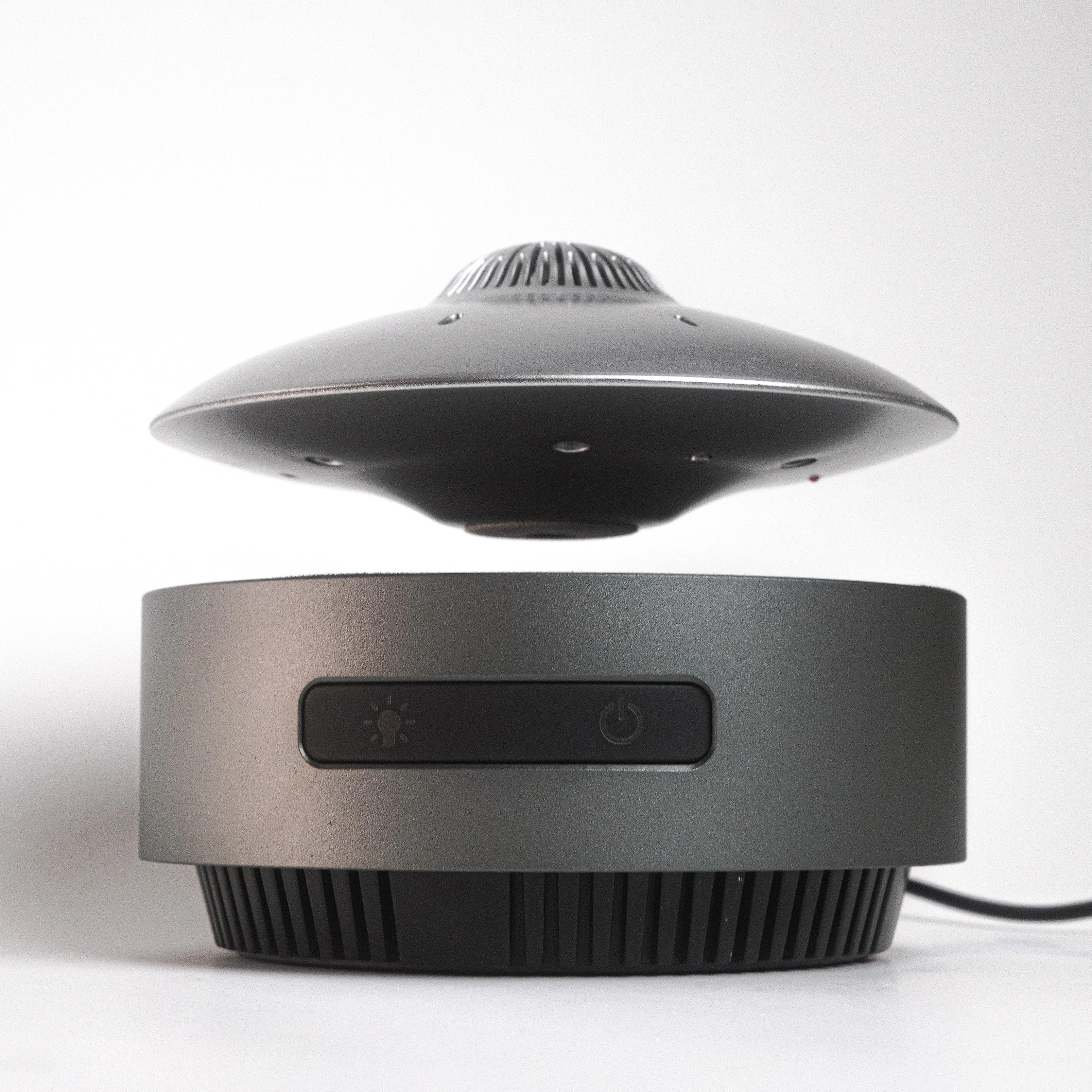 

Stylish Masterpiece Home And Office Decoration Automatic Lift-Down Floating UFO Bluetooth Speaker With Simple Radio Use