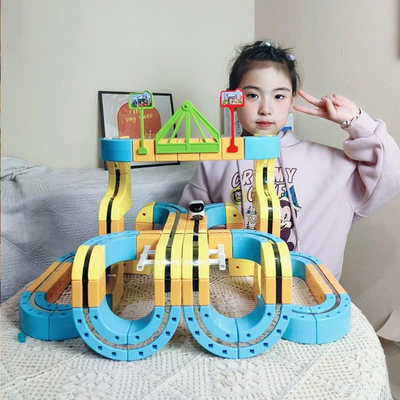 

New Magnetic Car STEM Racing Car Railtrack Set Montessori Motorized Train & Gravity Maze Toy, Christmas Gift for Kids