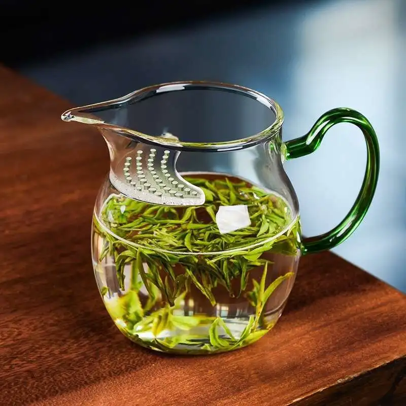 

Glass Tea Pitcher with Colorful Handle Crescent Moon Shape & Built-in Filter No Mess Easy Brewing Modern Zen Tea Ceremony