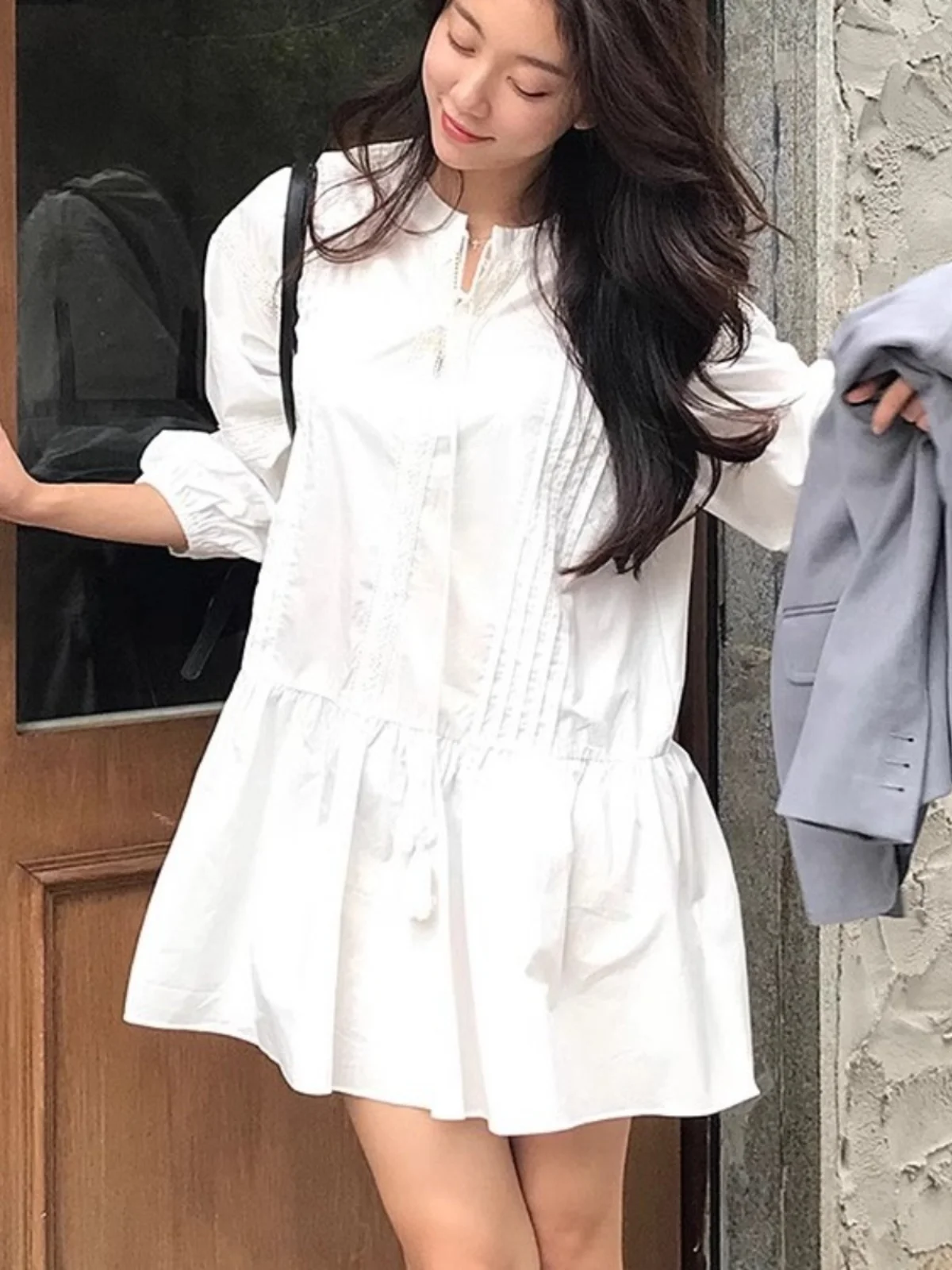 

Белая шикарная юбка-трапеция с рюшами и пэчворком, на одной пуговице, в корейском стиле, с завышенной талией, свободного кроя, короткая