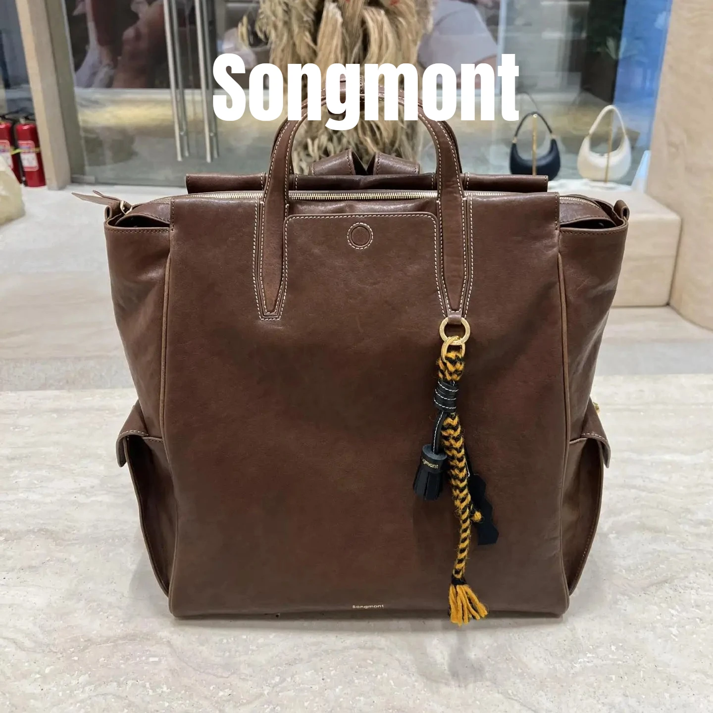 

Большой рюкзак Songmont для 16-дюймового ноутбука — винтажный стиль унисекс из кожи растительного дубления