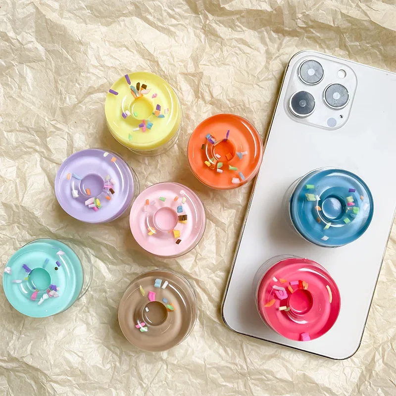 

Grips Tok Pop Phone 3D Grip Sockets Holder Finger Creative donut phone holder with retractable and foldable buckle on the back