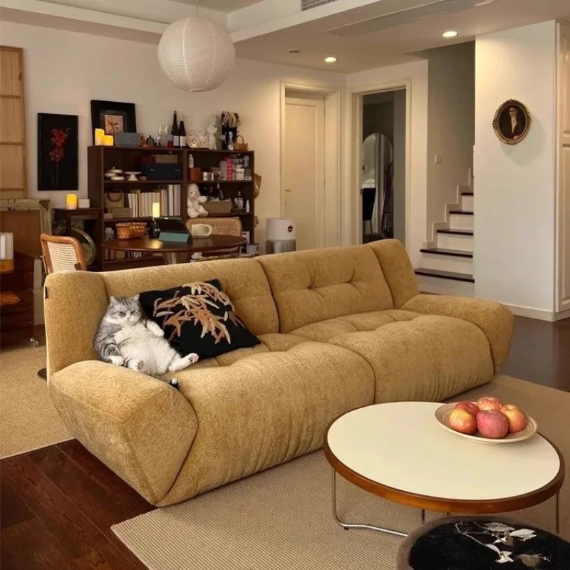 

French cream retro designer small apartment living room cloud fabric simple yellow trio Bi Xiong sofa