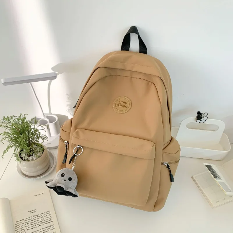 Popular solid color versatile backpack travel travel large capacity middle school student schoolbag casual backpack