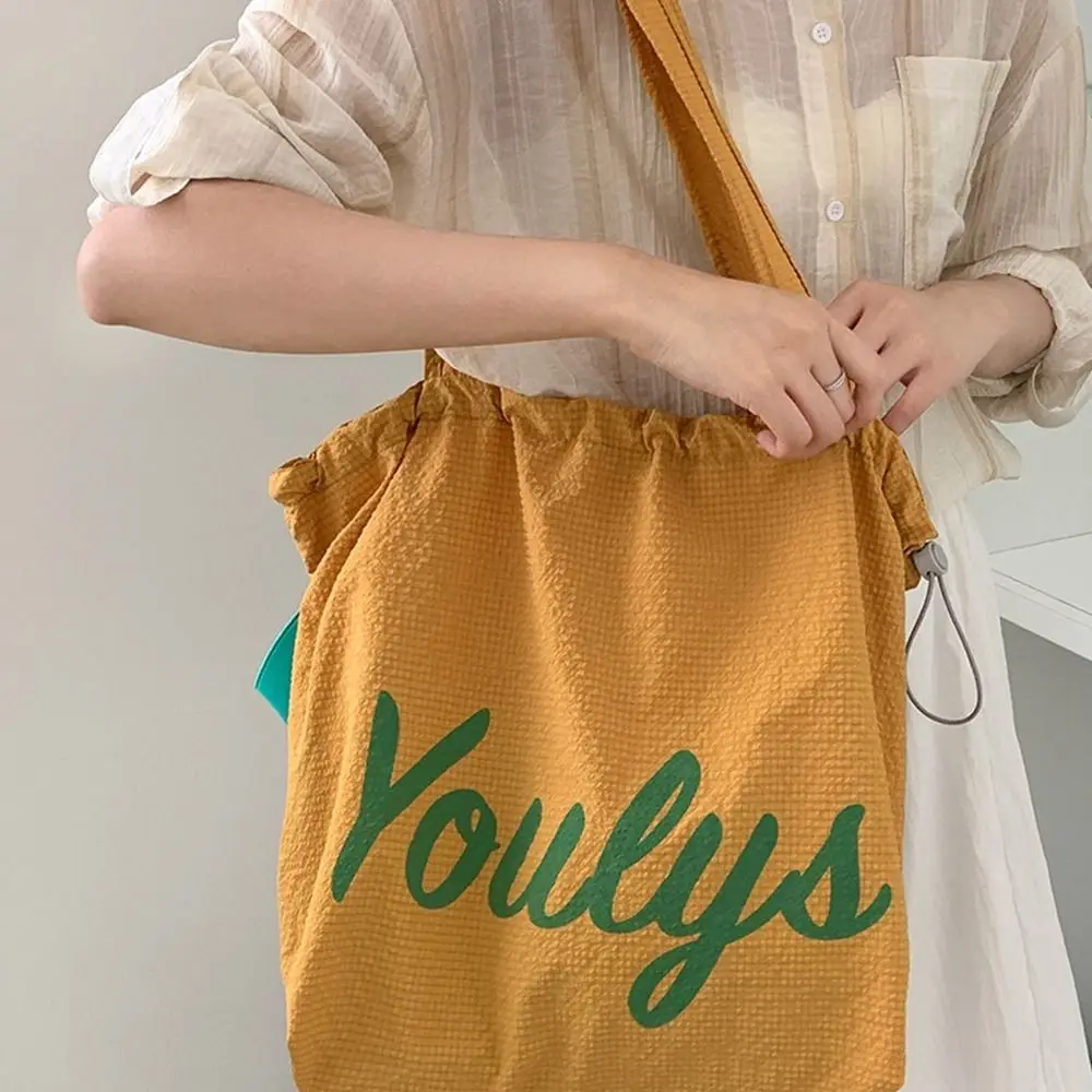 

Canvas Drawstring Tote Bag Korean Style Large Capacity Nylon Shoulder Bag Shopping Bag Beach Bag Letter Printed Handbag Work