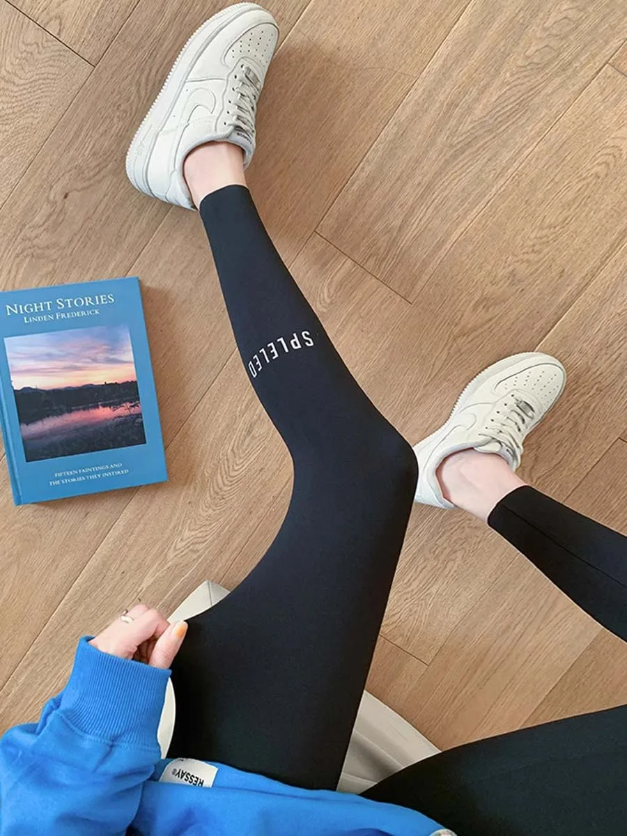 Pantalones de yoga ajustados de piel de arca de cintura alta Leggings con estampado de letras de primavera y otoño para mujer Abdomen una marca de moda Base Laye...