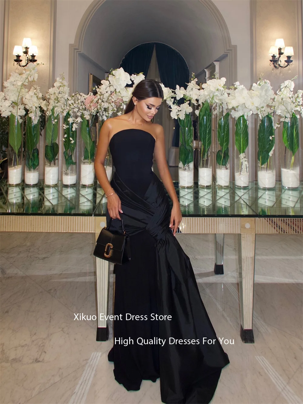 فساتين سهرة Xikuo مطوية بدون أكمام بطول الأرض بأربطة من الخلف لحفلات الزفاف من الساتان بدون حمالات فستان حفلة موسيقية مخصص